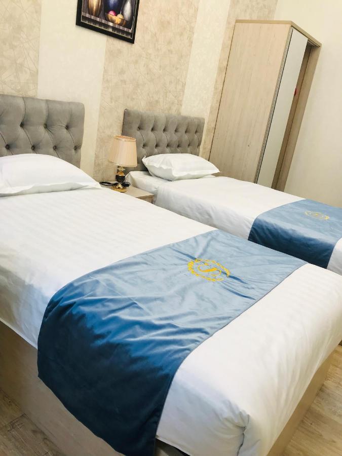 Wantong Hotel Tashkent Bagian luar foto