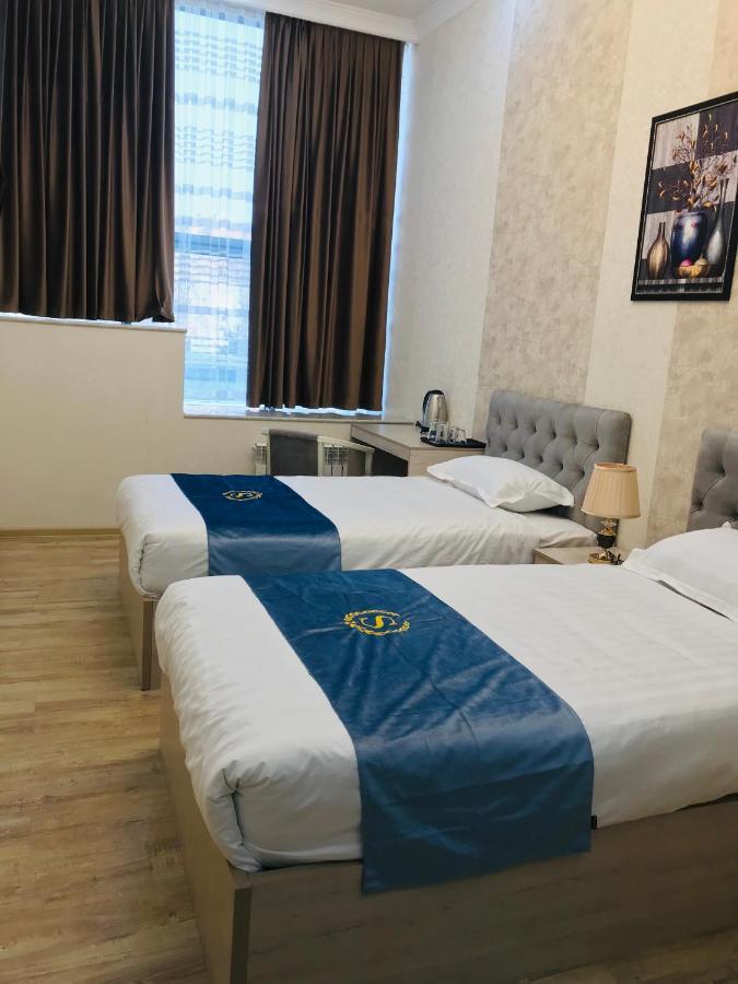 Wantong Hotel Tashkent Bagian luar foto